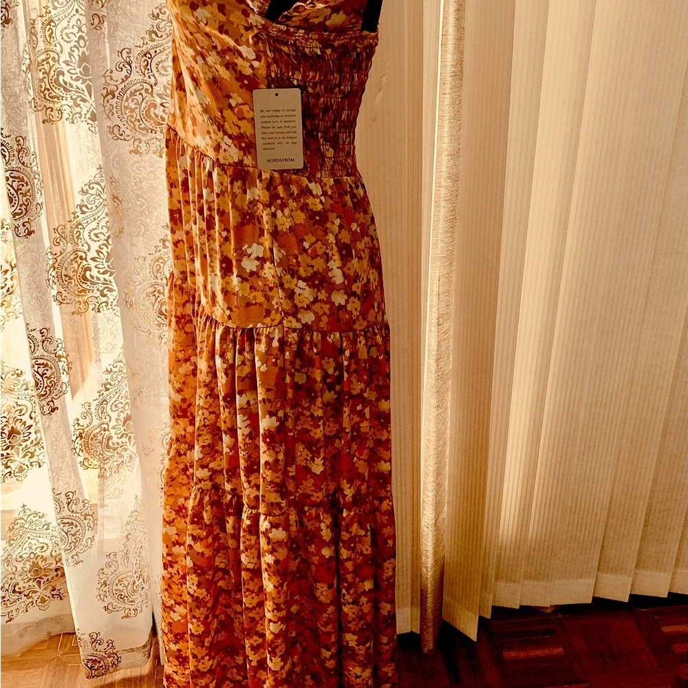 A beautiful rust flower girls dress  for spring and summer